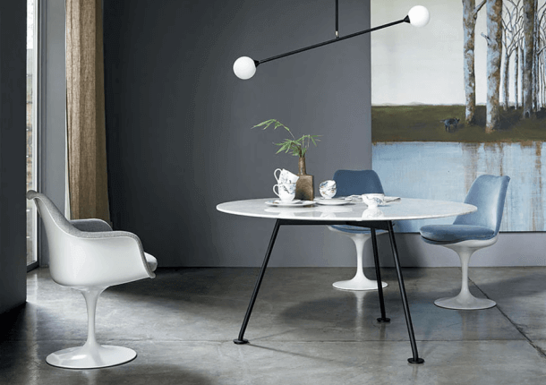 Grasshopper reound Dining Table with white chairs