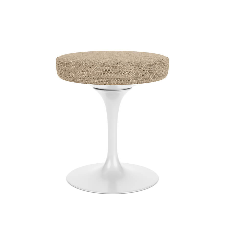 Tulip Side Stool with a white base and fabric seat in a white room