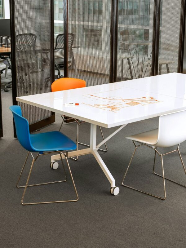 bertoia molded shell side chair in a meeting room