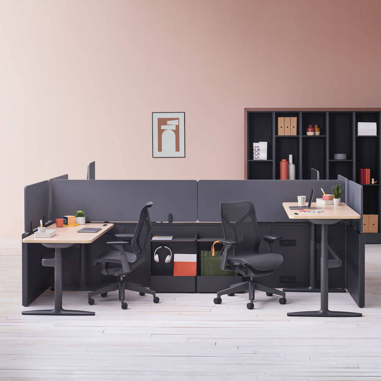 sit-to-stand-desk-in-a-modern-pink-office