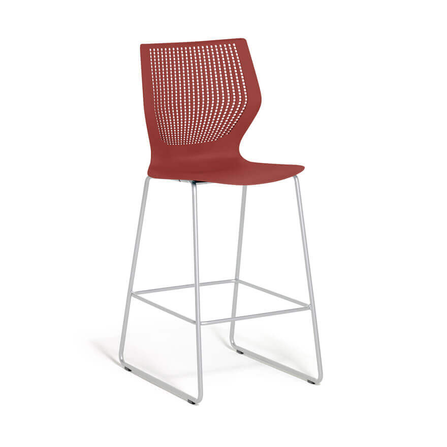 the front of a red MultiGeneration Barstool Chair by Knoll with metalic frame in a white room