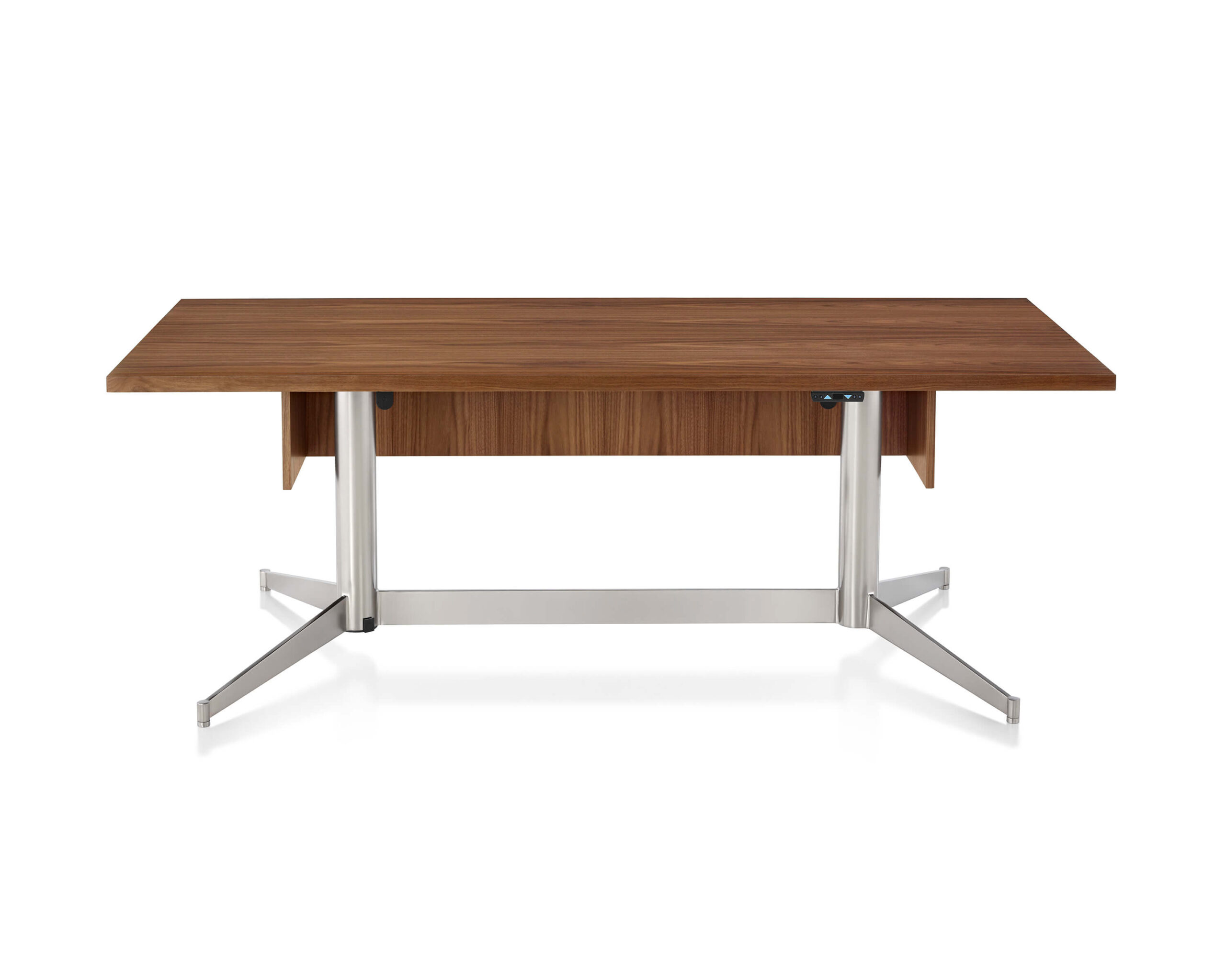 the front side of the of an MP Height Adjustable Table with a wooden top feturing the height adjustment controls in a white room