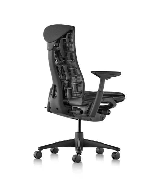 the back side angle of an embody chair by herman miller in black colour in a white room